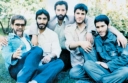 قرآن در دست آيه شهادت را قرائت كرد