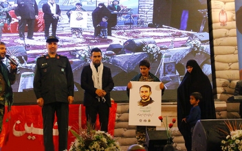 اهدای مدال طلای جهان به خانواده شهید مدافع حرم
